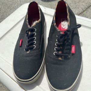 Vans women’s Size 7, black and leopard print